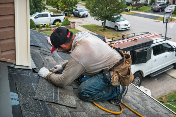 Professional Roofing technician working in Valley City, ND